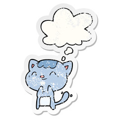 cartoon happy cat and thought bubble as a distressed worn sticker