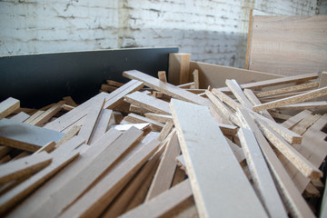 Taking photographs of wood plywood, used for making pellets