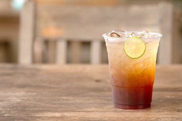 Ice tea with lemon and honey summer drink