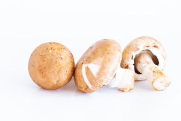 Fresh champignon mushrooms on white background, Isolated food and nature object