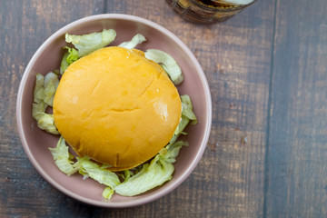Close up fresh delicious tasty homemade burger in bowl.