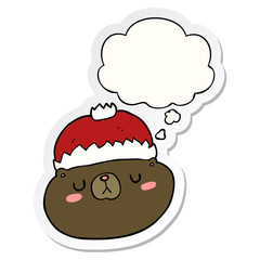 cartoon christmas bear and thought bubble as a printed sticker