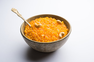 Sabudana or Sago Kesari dessert for Vrat Upvas also known as Sweetened Tapioca Pearl. served in a bowl. selective focus