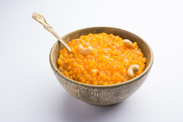 Sabudana or Sago Kesari dessert for Vrat Upvas also known as Sweetened Tapioca Pearl. served in a bowl. selective focus