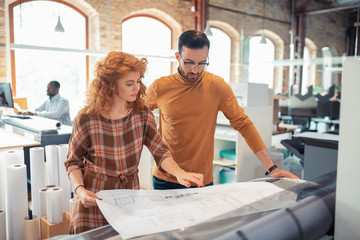 Two interior designers discussing new project together