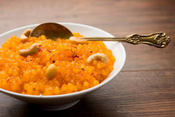 Sabudana or Sago Kesari dessert for Vrat Upvas also known as Sweetened Tapioca Pearl. served in a bowl. selective focus