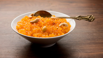 Sabudana or Sago Kesari dessert for Vrat Upvas also known as Sweetened Tapioca Pearl. served in a bowl. selective focus