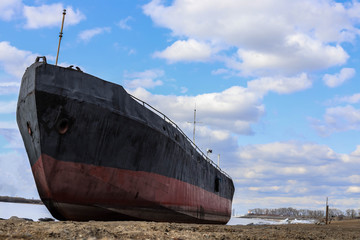 Old abandoned ship on the seashore
