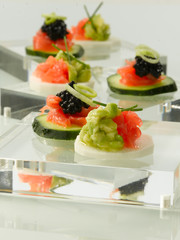 Tapas gourmet salmon, caviar, aguacate y calabacín , celebraciones. Gourmet tapas salmon, caviar, avocado and zucchini, celebrations.