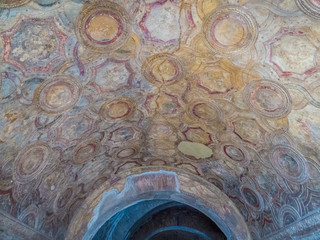 Pompeii, Italy - Ceiling decorations in the Bathhouse in Pompeii, the ancient Roman city, destroyed in 79 BC by the eruption of Mount Vesuvius. UNESCO World Heritage Site.