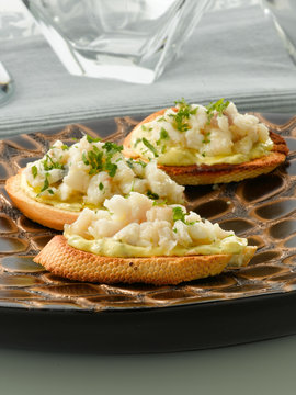 tostas de rape, aperitivo. monkfish toasts, appetizer.