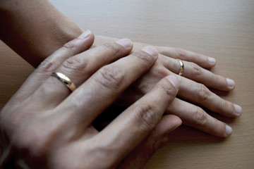 Holding Hands with Wedding Rings 1