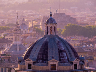 Fototapeta premium Rome, The Holy City - Aerial view of some of the many amazing Christian churches in Rome, Italy. View from the top of the Altare della Patria (English: 