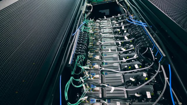 Big rack with modern computer at a data center.
