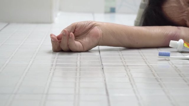 Elderly woman falling in bathroom because slippery surfaces