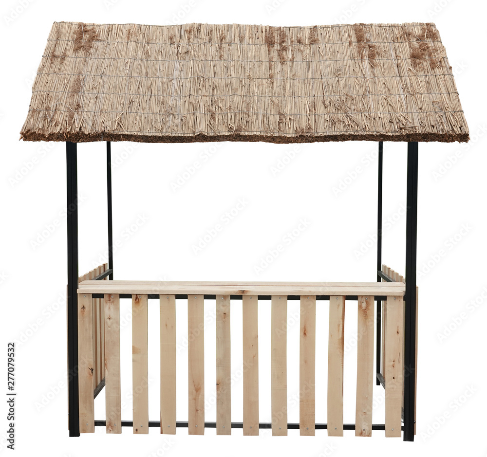 Wall mural Wooden market stand stall with thatched reed roof awning 