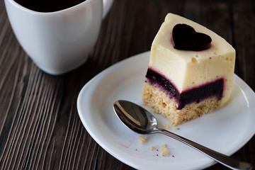 Vegan cake and cup of coffee. Soft focus.