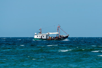 fish trawler on the baltic sea on a sunny day