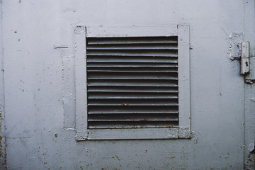 ventilation grille in the iron door
