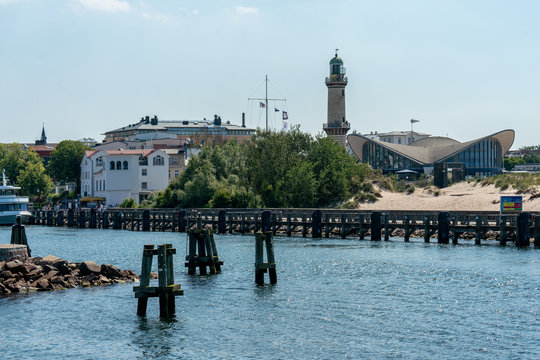 view on Warnemuende lighthouse and Teepott from a ship