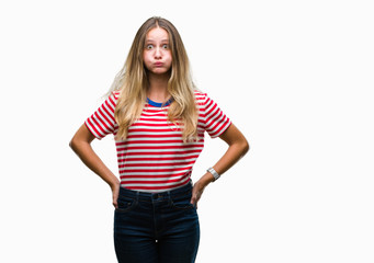 Fototapeta premium Young beautiful blonde woman over isolated background puffing cheeks with funny face. Mouth inflated with air, crazy expression.