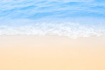 Fototapeta na wymiar Fantastic Wave of the blue sea on the sand beach background and texture