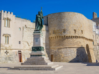 OTRANTO, ITALY - JULY 17, 2017: View of the main city square with the monument to the city martyrs, 813 inhabitants who were killed on August 14, 1480 by the Ottoman forces.