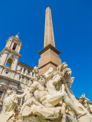 Fototapeta na wymiar River-God Ganges, Fountain of the Four Rivers (Italian: Fontana dei Quattro Fiumi) in Piazza Navona, Rome, Italy