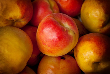 Fototapeta na wymiar Macro Photo food tropical fruit apricot. Texture background of yellow ripe apricots.