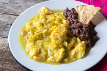 Mexican scrambled eggs in green sauce also called 
