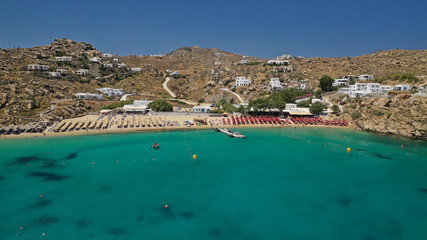 Aerial drone photo of iconic organised beach of Super Paradise with emerald clear sandy seascape,...