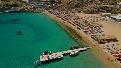 Aerial drone photo of iconic organised beach of Super Paradise with emerald clear sandy seascape,...