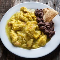 Mexican scrambled eggs in green sauce also called 