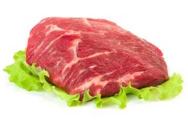 Fresh raw meat beef with green salad isolated on a white background