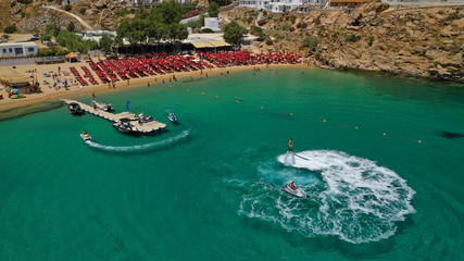 Aerial drone photo of iconic organised beach of Super Paradise with emerald clear sandy seascape,...