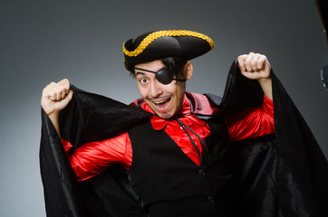 Man pirate against dark background