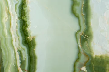 Fotobehang Elegant natural onyx background in light green tone. © Dmytro Synelnychenko