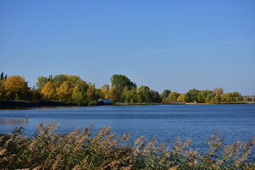 landscape with lake and blue sky
