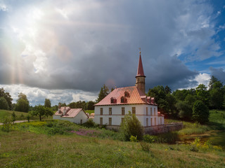 Fototapeta na wymiar Sunny landscape with old castle. Russia. Gatchina.