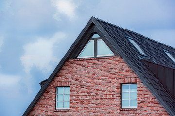 Frisian house roof and red-brick wall