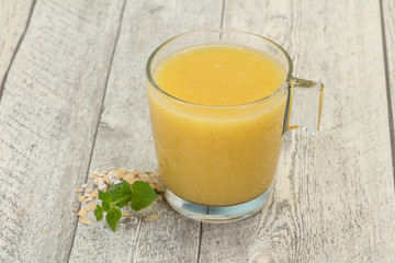 Dietary vegetarian oats milk over wooden