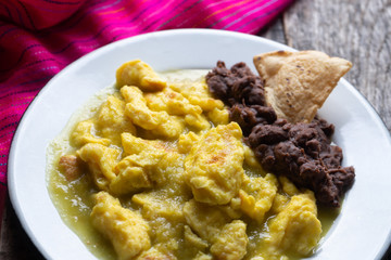 Mexican scrambled eggs in green sauce also called 