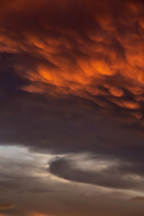 Dramatic Panoramic View of a cloudscape during a dark and colorful sunset. Taken over Beach Ancon...