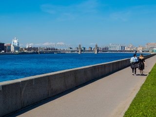 Neva River with the Bolsheokhtinsky Bridge and the Smolny Convent of the Resurrection (or Smolny Cathedral) in the background. In St. Petersburg, Russia