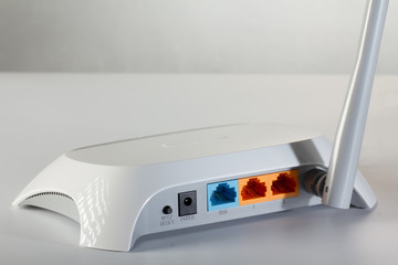 isolated white access point on table in office