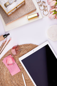 Feminin Flatlay Topview With Ipad On Basket Background With Copy Space Pink Roses Golden Notebook Sunglasses Lipstick Eyeshadow Cosmetics