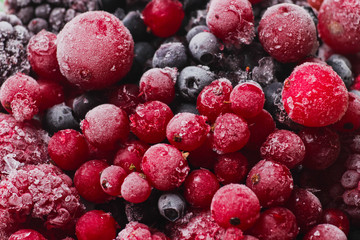 Frozen berries closeup. Cherries, currants, blueberries, blackberries