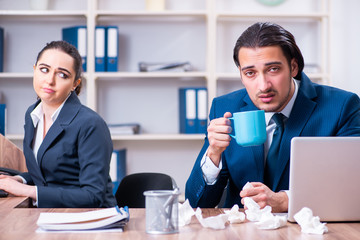 Two employees suffering at workplace 