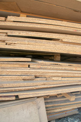 Taking photographs of wood plywood, used for making pellets