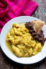 Mexican scrambled eggs in green sauce also called 